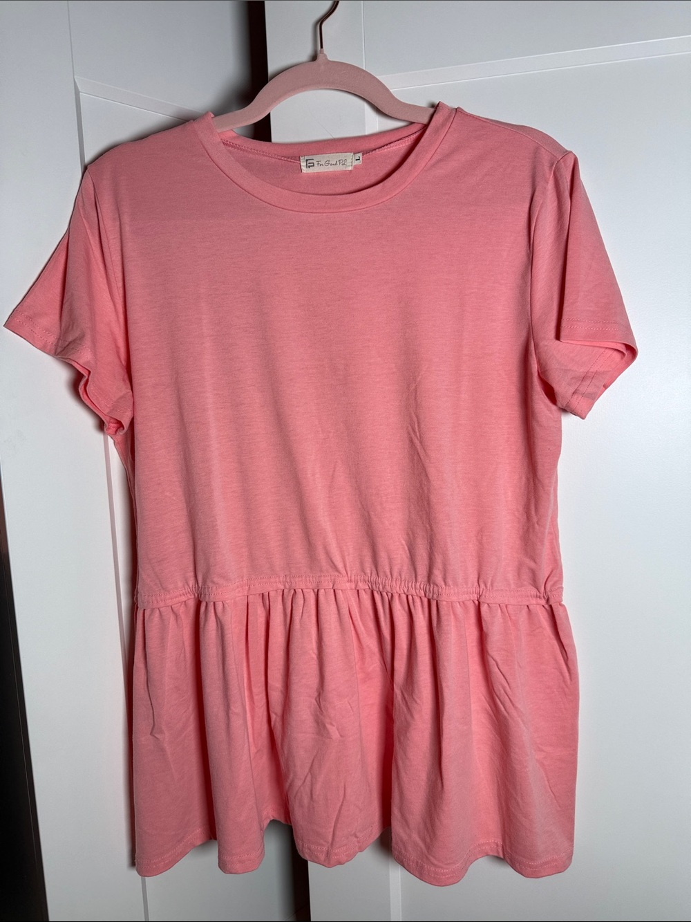 Women’s Pink Peplum Knit Cotton Top